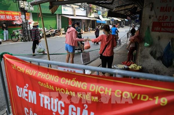 Hà Nội: Chia nhỏ khu vực giãn cách, mở rộng sản xuất, kinh doanh