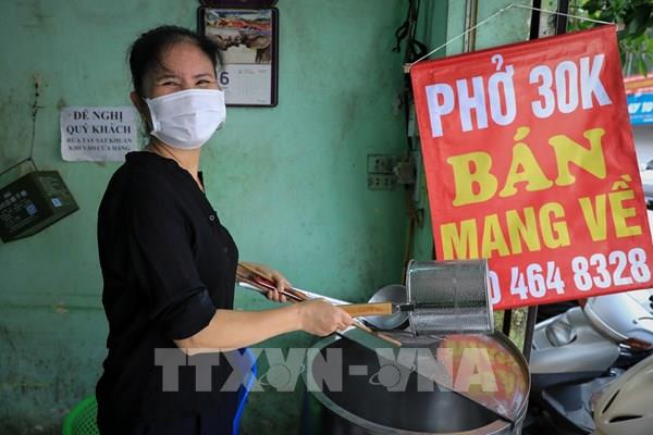 Hình ảnh một số loại hình dịch vụ tại Hà Nội đã mở cửa trở lại