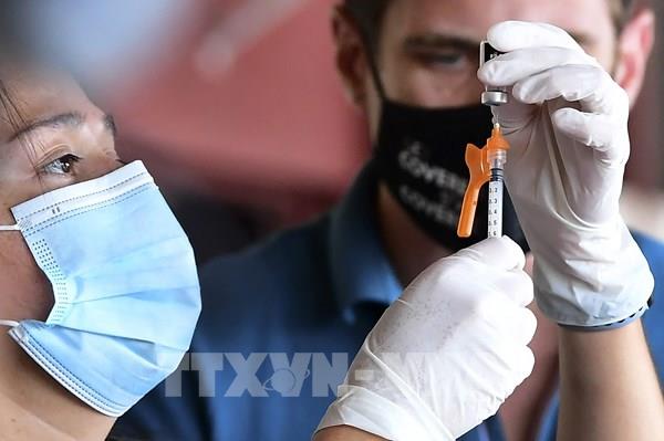 Nhìn lại thế giới 2021: Bước ngoặt hướng tới “bình thường mới”