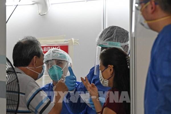 Giới chuyên gia Singapore lạc quan về khả năng ứng phó các biến thể mới