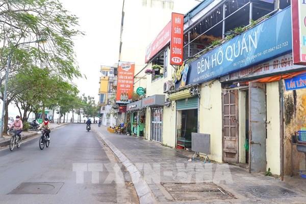 Từ 12h ngày 26/12, hàng quán tại quận Tây Hồ và Hoàn Kiếm chỉ được phép bán mang về