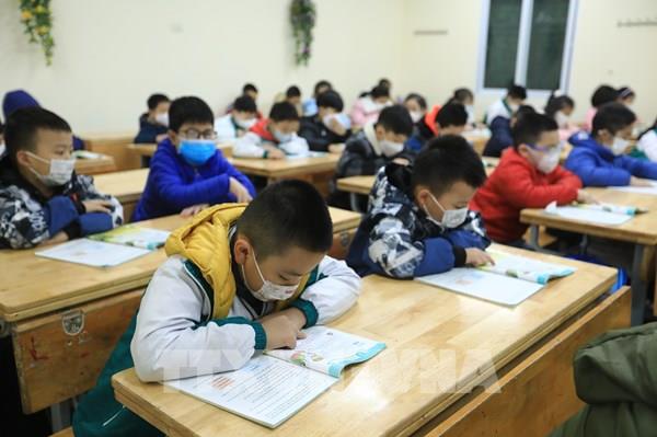 Học sinh từ lớp 1 - 6 của 12 quận Hà Nội trở lại trường từ ngày 21/2