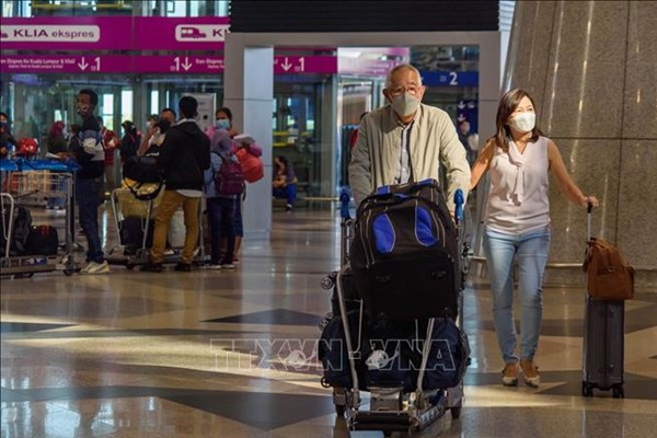 Malaysia đơn giản hóa thủ tục nhập cảnh