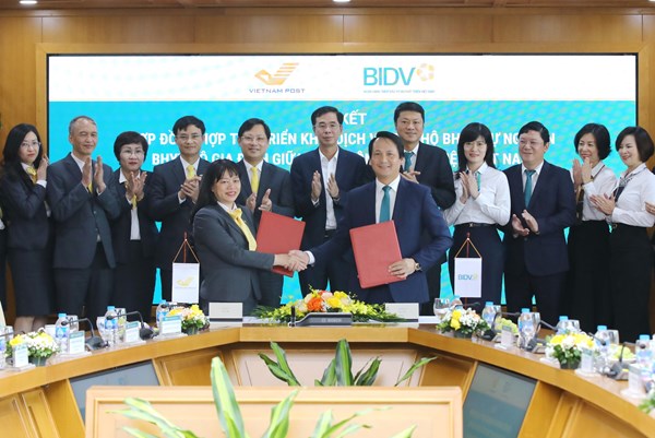 BIDV ký hợp tác triển khai dịch vụ thu hộ bảo hiểm với Vietnam Post