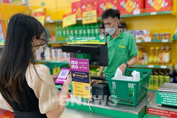 Bách Hóa Xanh và MoMo hợp tác thanh toán không tiền mặt trong ngành bán lẻ