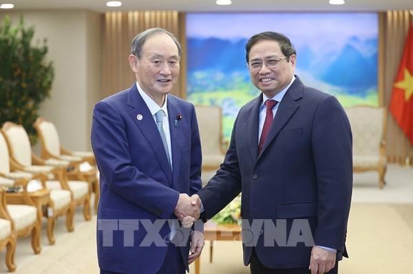 Thủ tướng Phạm Minh Chính tiếp nguyên Thủ tướng Nhật Bản Suga Yoshihide
