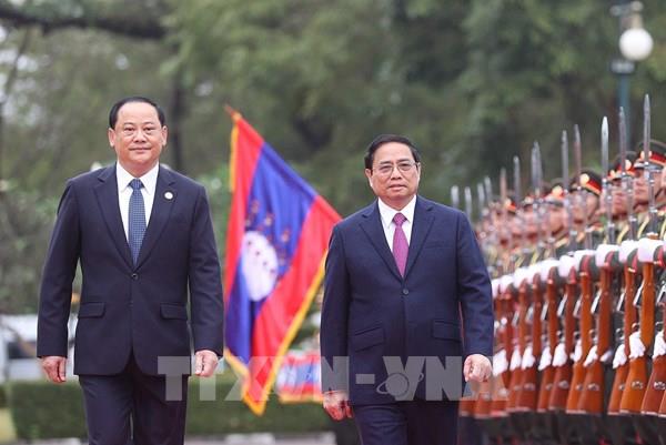 Thủ tướng Chính phủ Phạm Minh Chính bắt đầu thăm chính thức CHDCND Lào