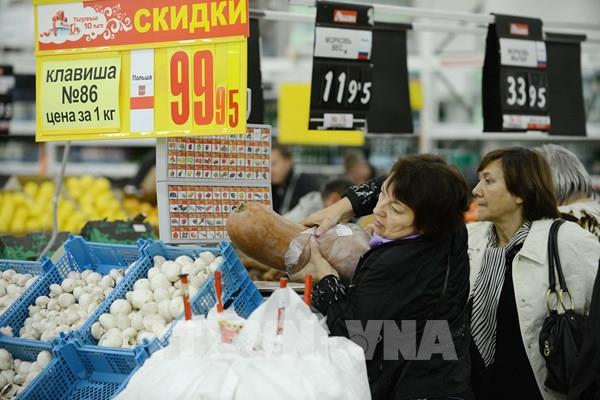 IIF: Tổng nợ toàn cầu giảm năm đầu tiên kể từ năm 2015