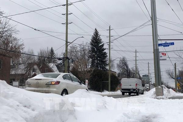Canada: Tuyết rơi dày cản trở giao thông ở thủ đô Ottawa