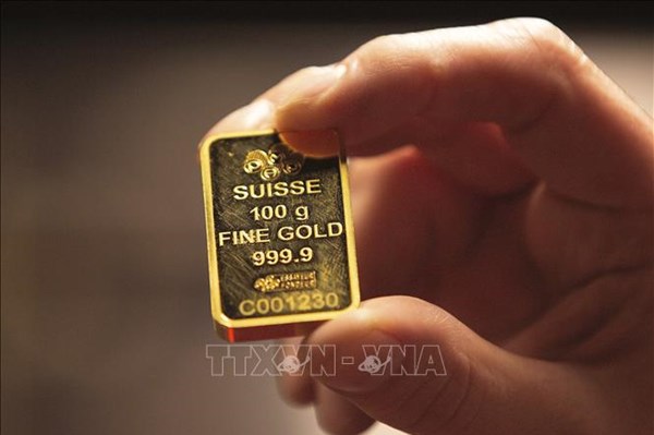 Giá vàng thế giới đi lên khi Fed tiếp tục tăng lãi suất
