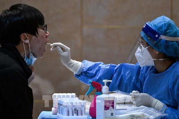 Khách nhập cảnh Trung Quốc sẽ không phải xuất trình kết quả xét nghiệm COVID-19