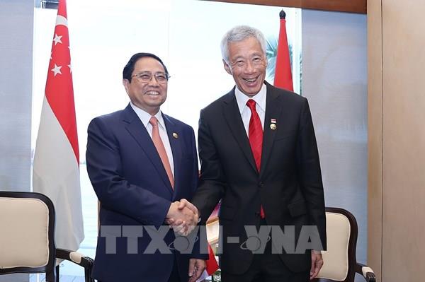 Thủ tướng Phạm Minh Chính gặp Thủ tướng Singapore Lý Hiển Long