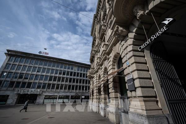 UBS hoàn tất thương vụ thâu tóm Credit Suisse