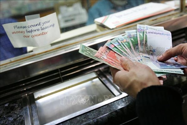 "Dư chấn" của chính sách lãi suất Mỹ đối với đồng nội tệ Malaysia