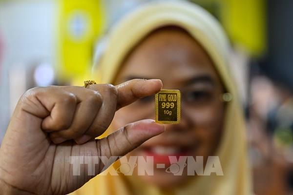 Các yếu tố trái chiều duy trì giá vàng ít biến động