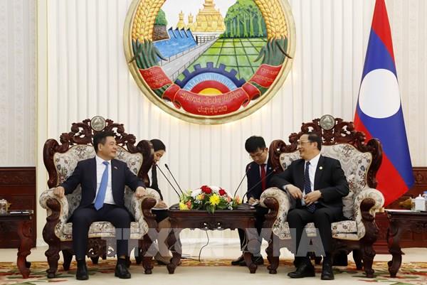 Việt Nam - Lào tập trung tháo gỡ khó khăn cho xuất khẩu than, điện