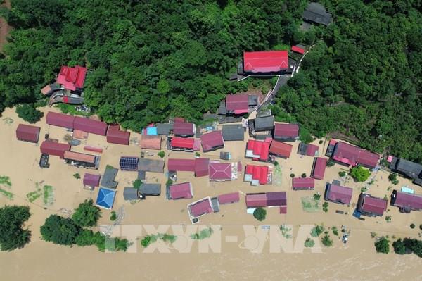 Trung Quốc huy động lực lượng cứu hộ đê hồ Động Đình bị vỡ