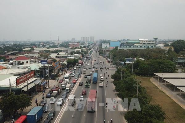 Đề xuất sớm đầu tư các dự án đồng bộ với mở rộng Quốc lộ 13