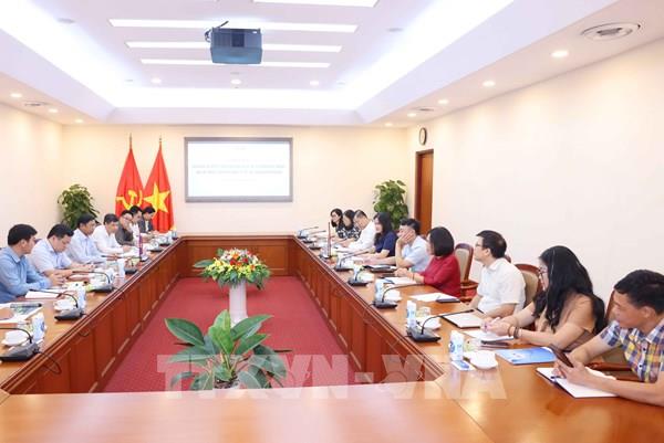Chia sẻ kinh nghiệm trong chuyển đổi số báo chí hai nước Việt Nam - Lào