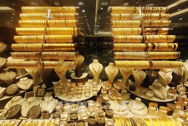 Chịu sức ép từ đồng USD, giá vàng rời khỏi mức cao kỷ lục
