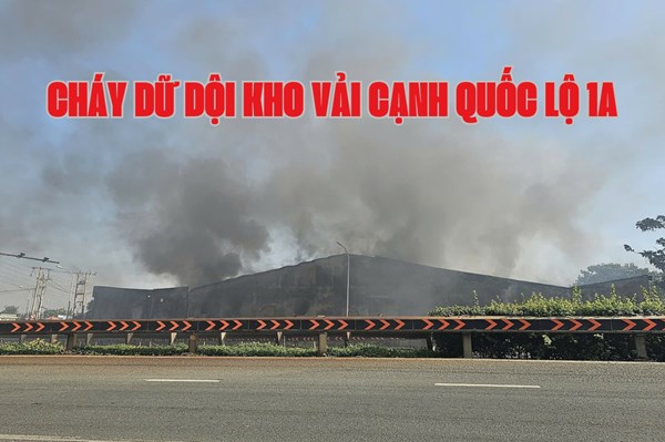 Thành phố Hồ Chí Minh: Cháy dữ dội kho vải cạnh Quốc lộ 1A