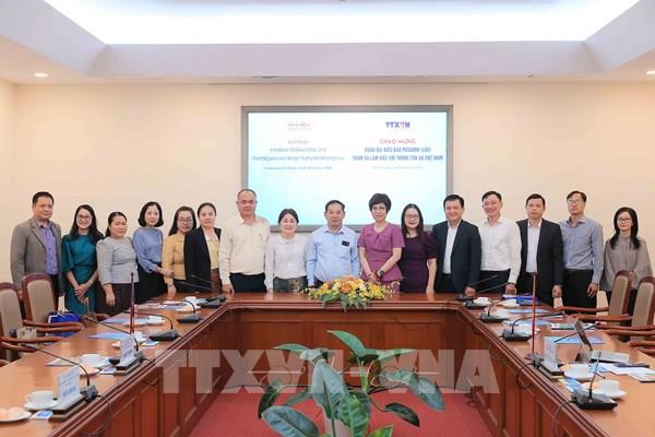 Tổng Giám đốc TTXVN tiếp Đoàn đại biểu Báo Pasaxon (Lào)