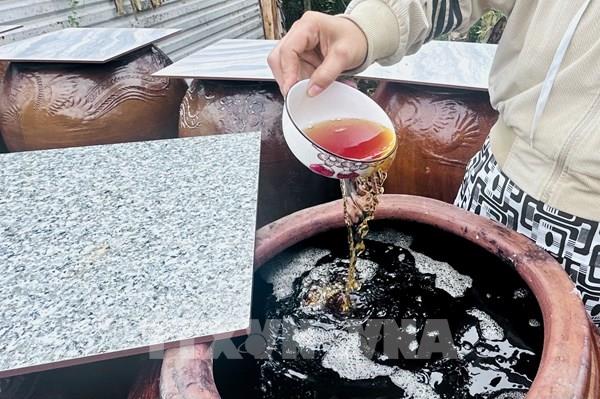 Giữ hồn quê trong từng giọt nước mắm cá linh