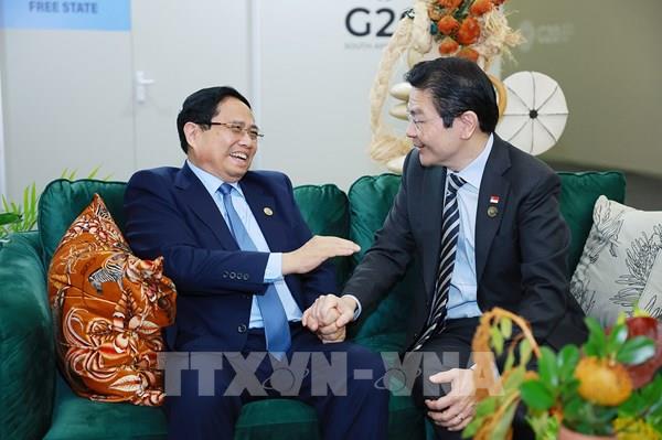 Thủ tướng Phạm Minh Chính gặp Thủ tướng Hà Lan và Thủ tướng Singapore