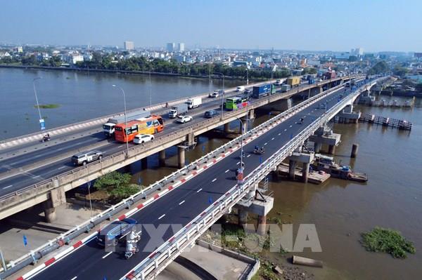 Cầu Bình Phước 1 trên Quốc lộ 1 hoàn thành nâng tĩnh không thêm hơn 1,2m