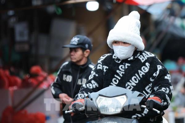 Hình ảnh người dân Hà Nội đón đợt rét sâu nhất đầu năm 2026
