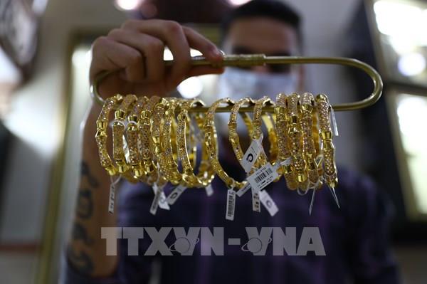 Giải mã đợt sụt giảm kỷ lục của giá vàng giữa tâm bão Trung Đông