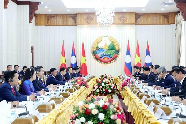 Thường trực Ban Bí thư Trần Cẩm Tú hội kiến Thủ tướng Lào Sonexay Siphandone