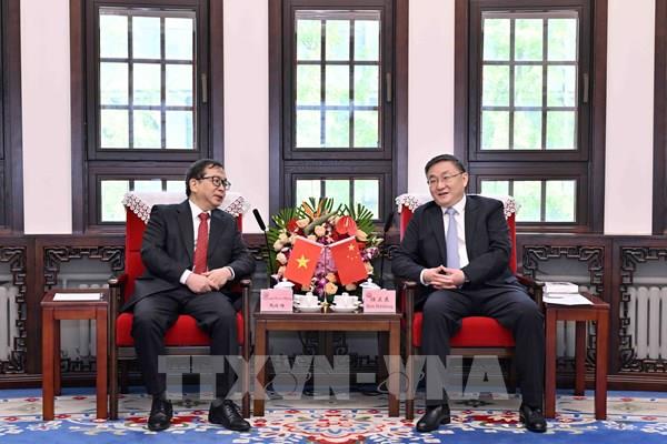 TTXVN và Tân Hoa xã tăng cường hợp tác về chuyển đổi số và ứng dụng công nghệ