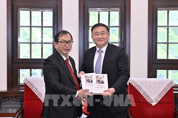 TTXVN và Tân Hoa xã tăng cường hợp tác về chuyển đổi số và ứng dụng công nghệ