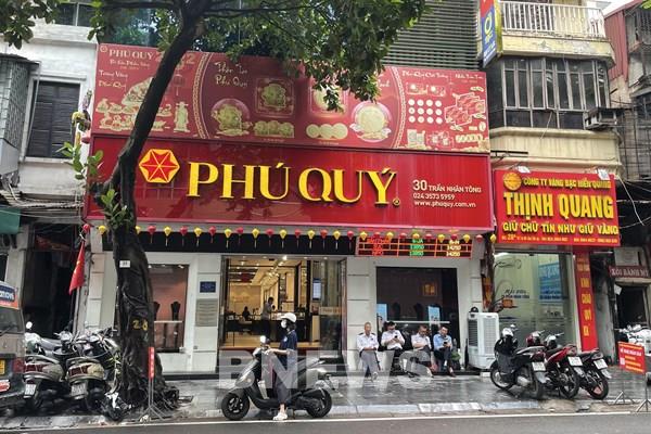 Giá vàng phục hồi sau quyết định giữ nguyên lãi suất của Fed, thị trường trong nước vẫn trầm lắng