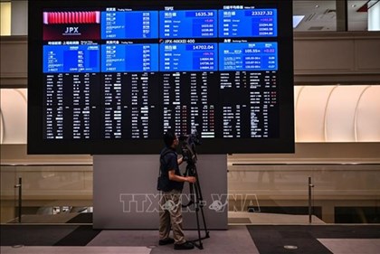 Thị trường châu Á hưởng ứng đà tăng kỷ lục của chứng khoán Mỹ