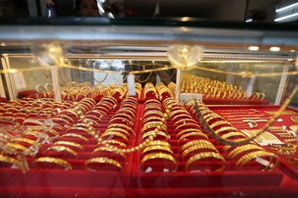 Giá vàng thu hẹp đà giảm sau số liệu kinh tế của Mỹ