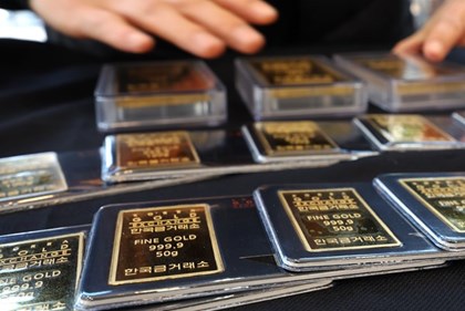 Giá vàng thế giới khép tuần ở trên mốc 5.000 USD/ounce