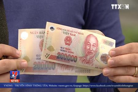 Xung quanh việc sử dụng hình ảnh đồng tiền